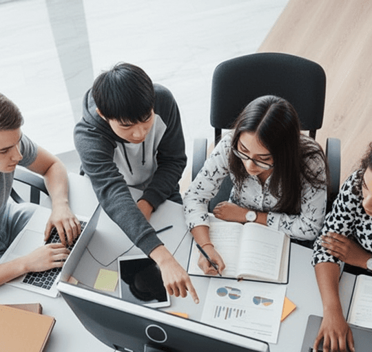 A care finance team reviewing revenue reports around a desk
