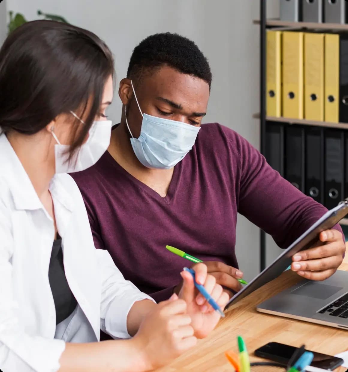 Care professionals reviewing company structure