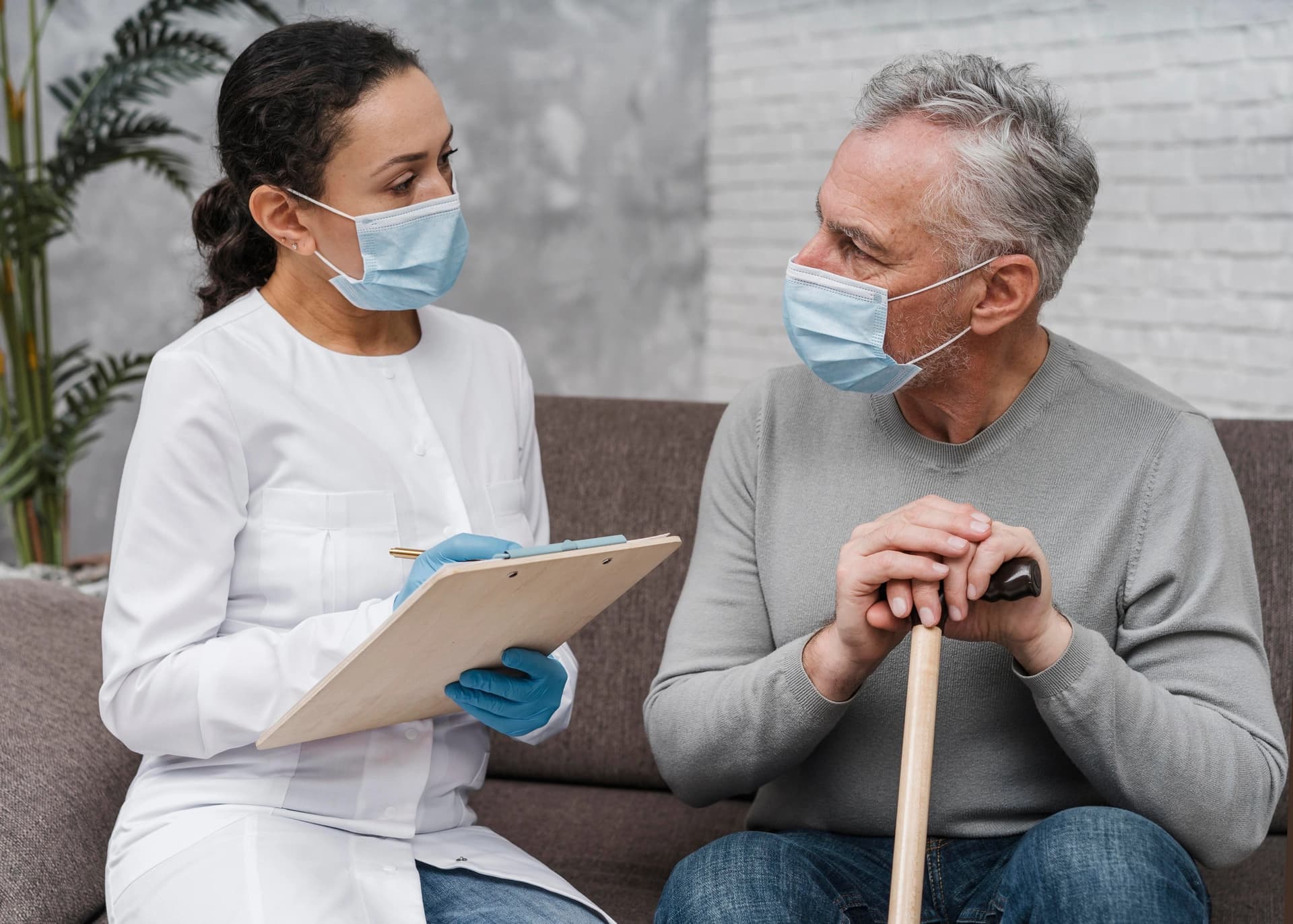 Social worker taking care of a senior woman