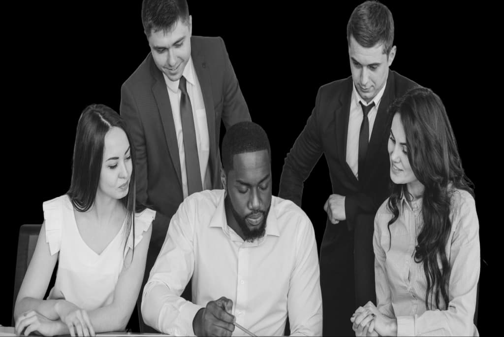 Group of business people around a desk