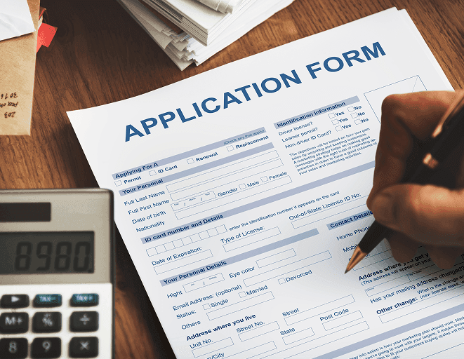 A registration application form being completed