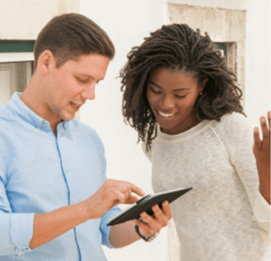 Domiciliary care provider reviewing compliance with a consultant