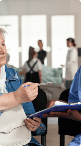 Care consultant guiding a client through care agency setup