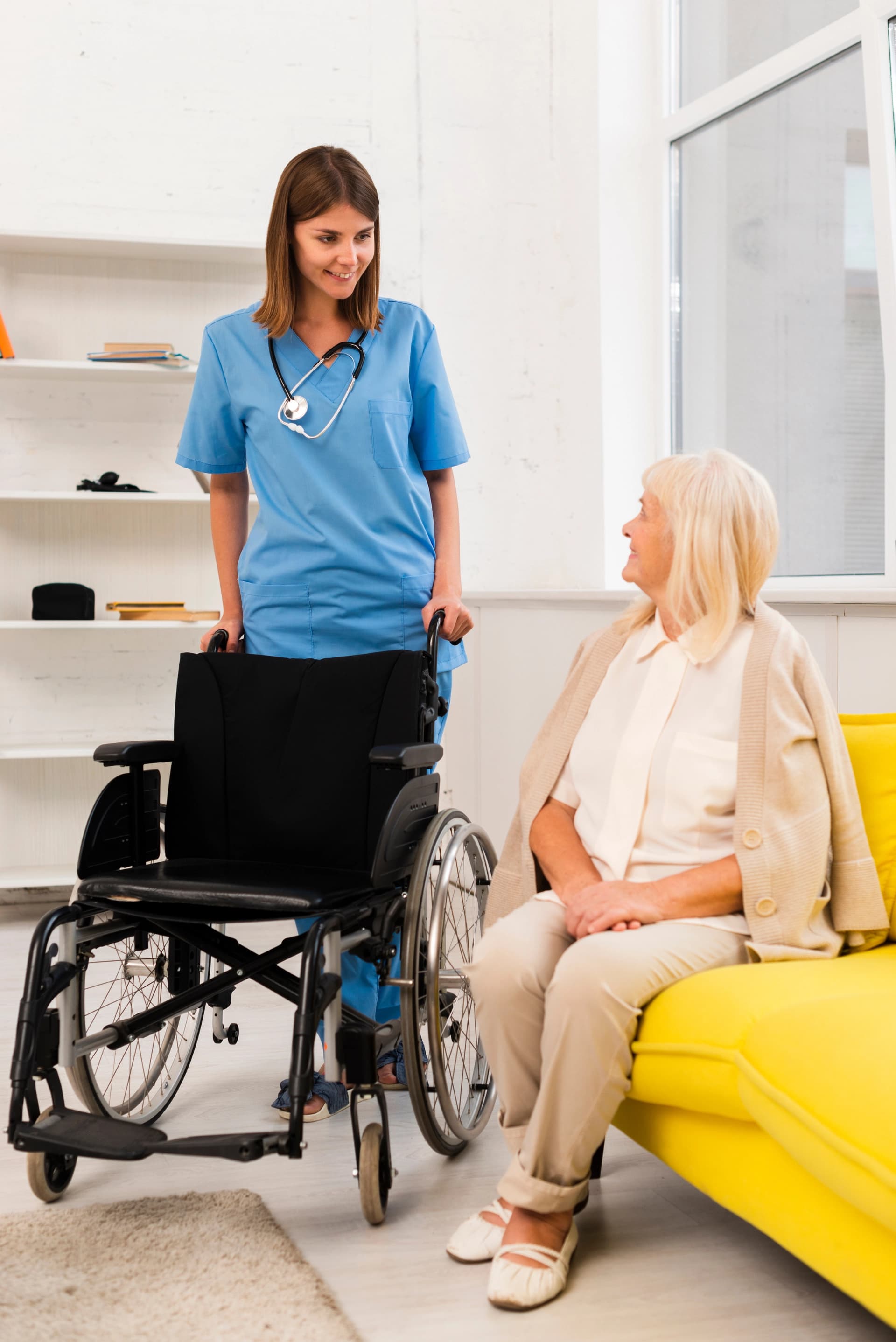 Social worker supporting an older woman