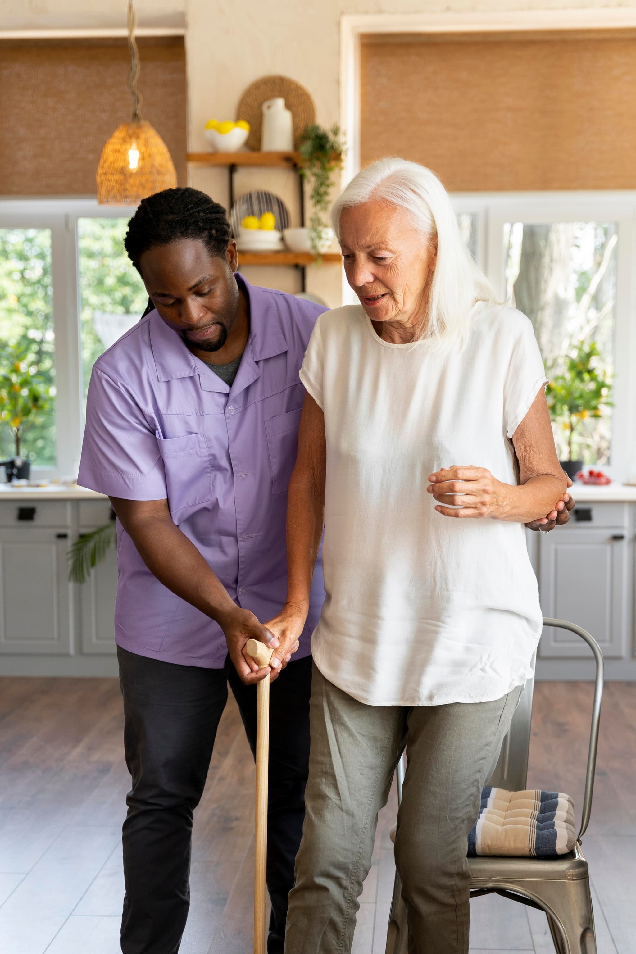 Social worker taking care of an older woman