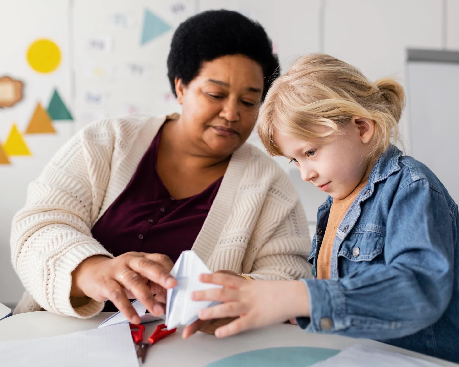 A child receiving support from a care professional