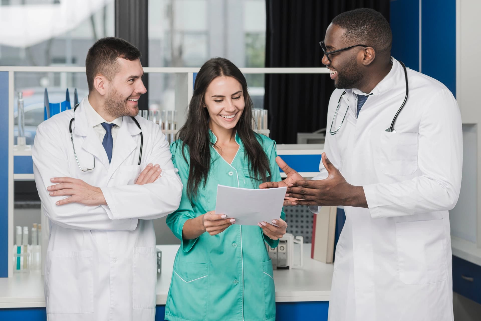 Care professionals reviewing tender documents