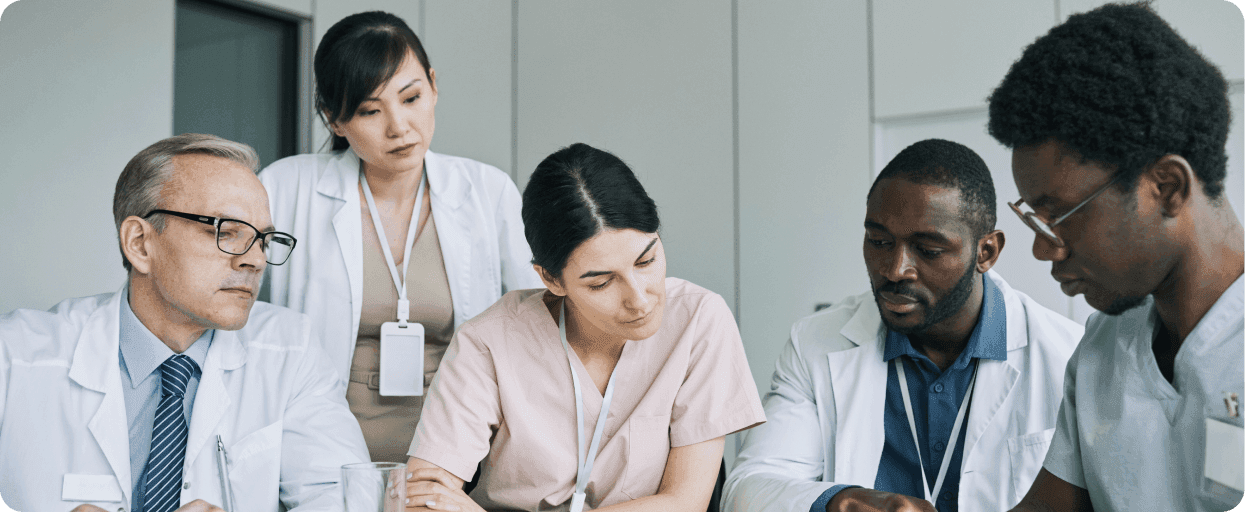 Care team reviewing evidence for their CQC assessment