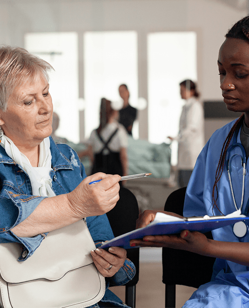 A care worker supporting a service user during a policy review
