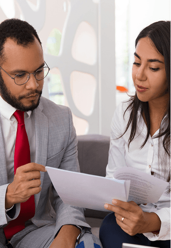 Consultants reviewing RQIA domiciliary care policy documents