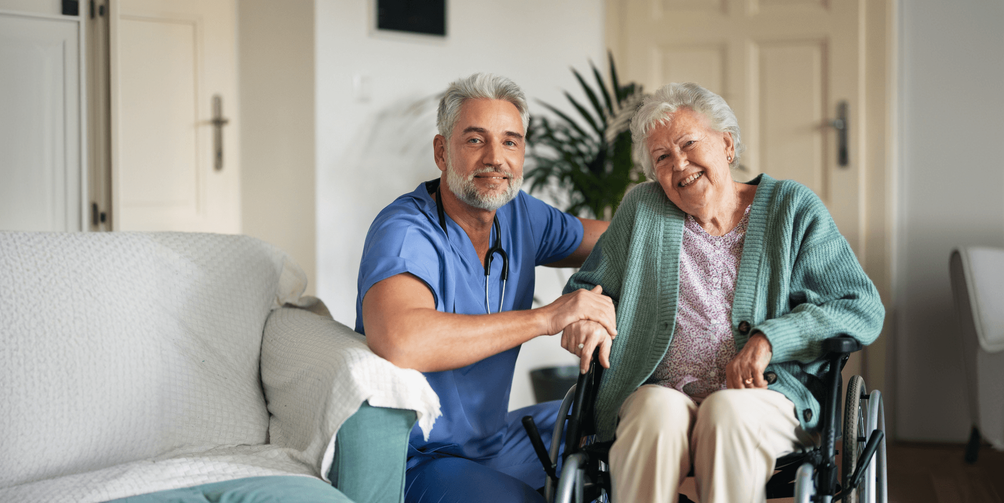 Care professional with an elderly resident in a care home