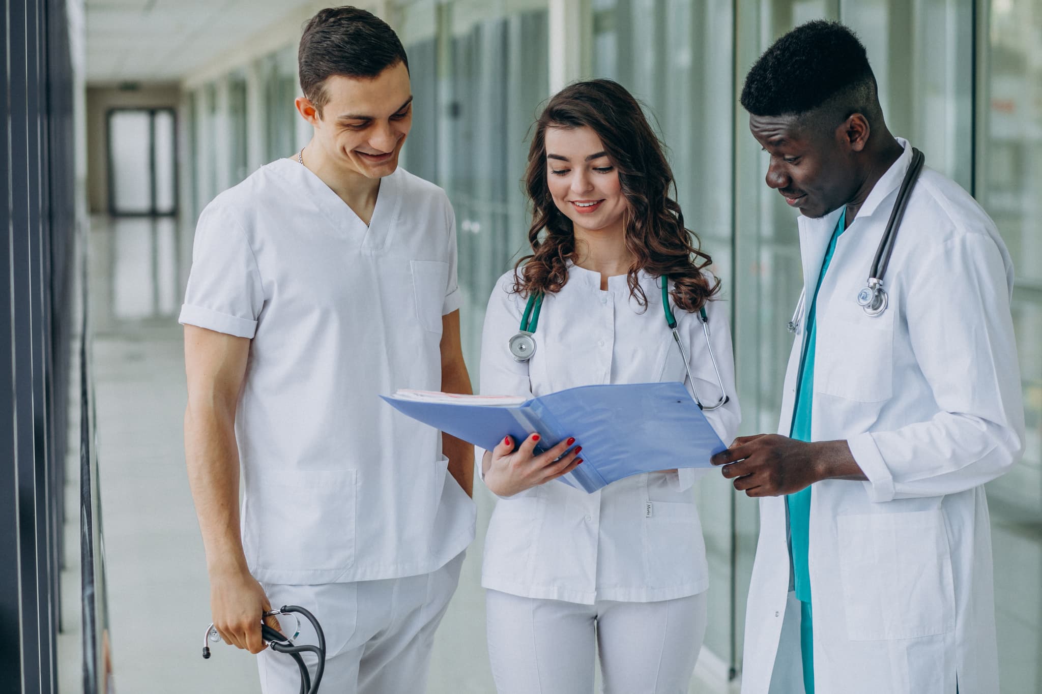 Care professionals reviewing a block-bed framework tender