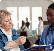 Nurse assisting an older resident